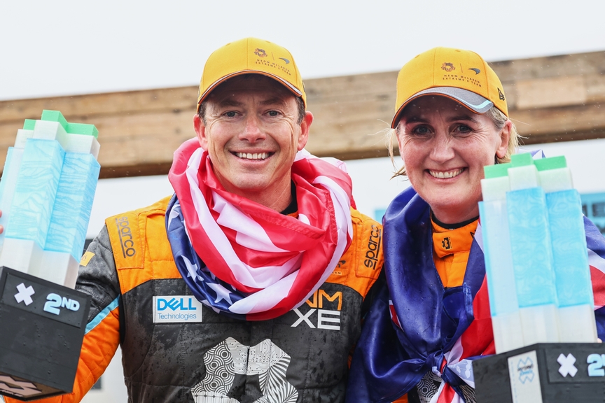 MAY 14: Tanner Foust (USA), NEOM McLaren Extreme E, and Emma Gilmour (NZL), NEOM McLaren Extreme E, 2nd position, with their trophies during the Scotland X-Prix on May 14, 2023. (Photo by Colin McMaster / LAT Images)