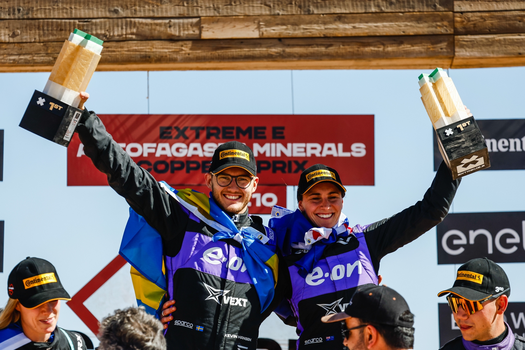 DECEMBER 03: Molly Taylor (AUS) / Kevin Hansen (SWE), Veloce Racing, 1st position, with their trophies on the podium during the Copper X-Prix, Chile on December 03, 2023. (Photo by Sam Bloxham / LAT Images)
