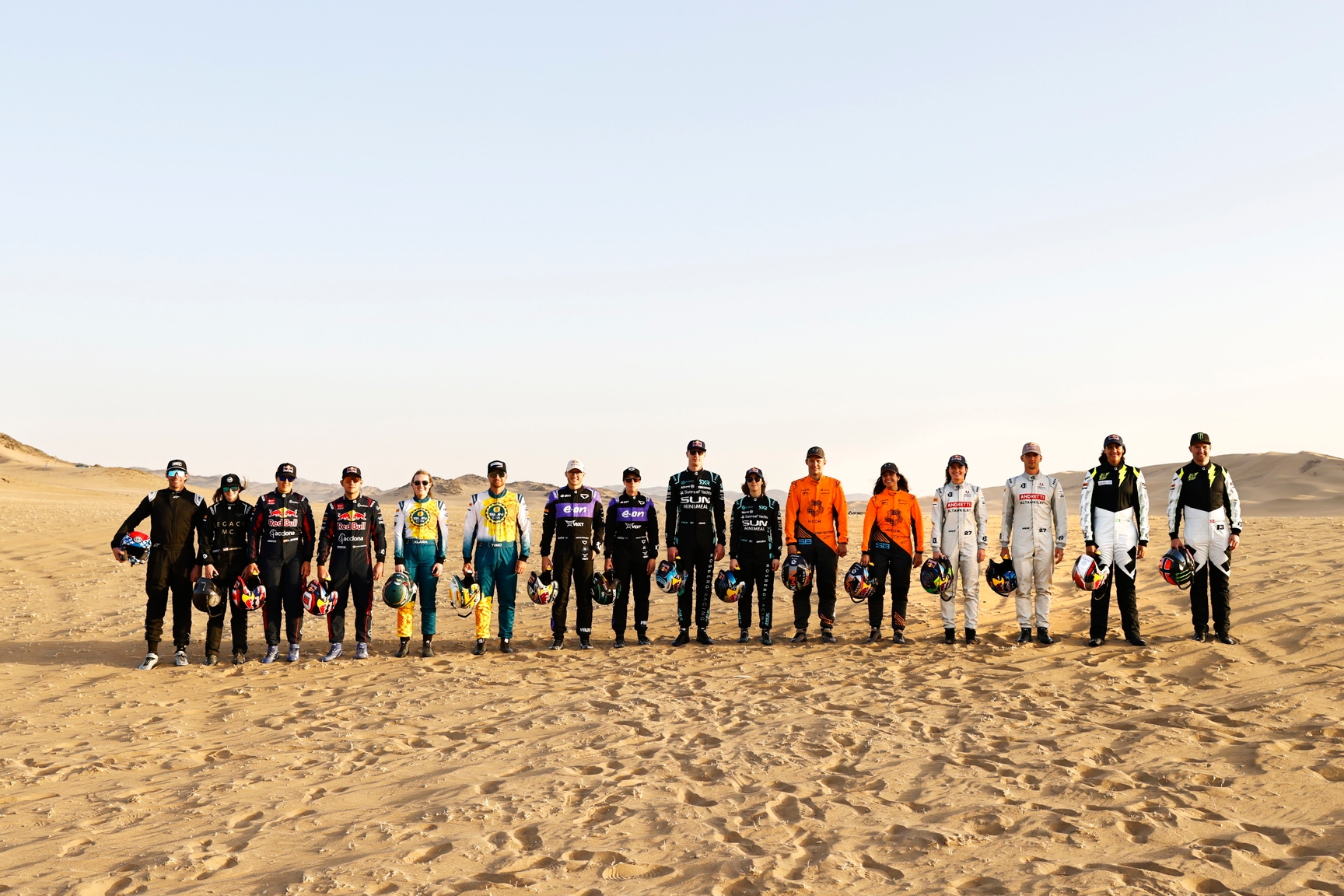 FEBRUARY 16: Drivers line up L-R
Gray Leadbetter, (USA) / Travis Pastrana (USA), LEGACY MOTOR CLUB (LEGACY M.C.), Laia Sanz (ESP) / Fraser McConnell (JAM), Acciona | Sainz XE Team, Klara Andersson (SWE) / Timo Scheider (DEU), SUN Minimeal Team, Molly Taylor (AUS) / Kevin Hansen (SWE), Veloce Racing, Mikaela Ahlin-Kottulinsky (SWE) / Johan Kristoffersson (SWE), Rosberg X Racing, Cristina Gutierrez (ESP) / Mattias Ekstrom (SWE), NEOM McLaren Extreme E, Catie Munnings (GBR) / Timmy Hansen (SWE), Andretti Altawkilat Extreme E, Dania Akeel (KSA) / Andreas Bakkerud (NOR), JBXE during the Saudi Arabia on February 16, 2024. (Photo by Andrew Ferraro / LAT Images)