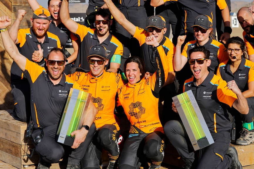 FEBRUARY 17: Cristina Gutierrez (ESP) / Mattias Ekstrom (SWE), NEOM McLaren Extreme E celebrate , 2nd position, Gary Paffett, Sporting Director, NEOM McLaren Extreme E Team Ian James, Team Principal, NEOM McLaren Formula E Team during the Saudi Arabia on February 17, 2024. (Photo by Andrew Ferraro / LAT Images)