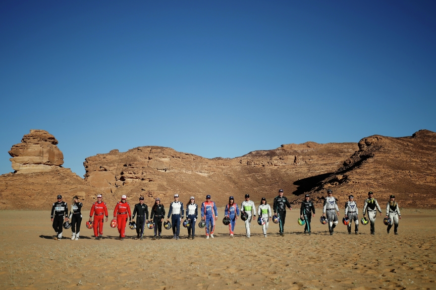ALULA, SAUDI ARABIA - APRIL 01: (l-r) Oliver Bennett (GBR), Hispano Suiza Xite Energy Team, Christine 'GZ' Giampaoli Zonca (ESP), Hispano Suiza Xite Energy Team, Carlos Sainz (ESP), Acciona | Sainz XE Team, Laia Sanz (ESP), Acciona | Sainz XE Team, Cristina Gutierrez (ESP), X44, Sebastien Loeb (FRA), X44, Timmy Hansen (SWE), Andretti United Extreme E, Catie Munnings (GBR), Andretti United Extreme E, Kyle Leduc (USA), Segi TV Chip Ganassi Racing, Sara Price (USA), Segi TV Chip Ganassi Racing, Stephane Sarrazin (FRA), Veloce Racing, Jamie Chadwick (GBR), Veloce Racing, Johan Kristoffersson (SWE), Rosberg X Racing, Molly Taylor (AUS), Rosberg X Racing, Mattias Ekstrom (SWE), ABT CUPRA XE, Claudia Hurtgen (GER), ABT CUPRA XE, Jenson Button (GBR), JBXE Extreme-E Team, and Mikaela Ahlin-Kottulinsky (SWE), JBXE Extreme-E Team during the Desert X-Prix at AlUla on April 01, 2021 in AlUla, Saudi Arabia. (Photo by Zak Mauger / LAT Images)