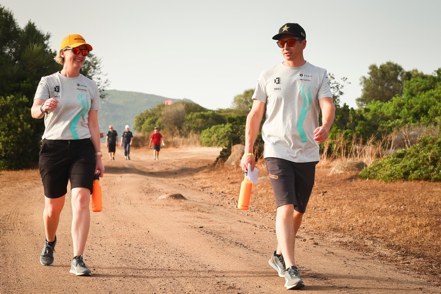 JULY 05: Emma Gilmour (NZL), NEOM McLaren Extreme E, and Tanner Foust (USA), NEOM McLaren Extreme E, walk the course during the Sardinia on July 05, 2022.