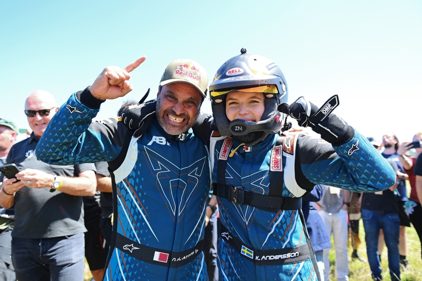 NOVEMBER 27: Nasser Al-Attiyah (QAT), Abt Cupra XE, and Klara Andersson (SWE), Abt Cupra XE, celebrate 1st Position during the Punta del Este on November 27, 2022. (Photo by Sam Bagnall / LAT Images)